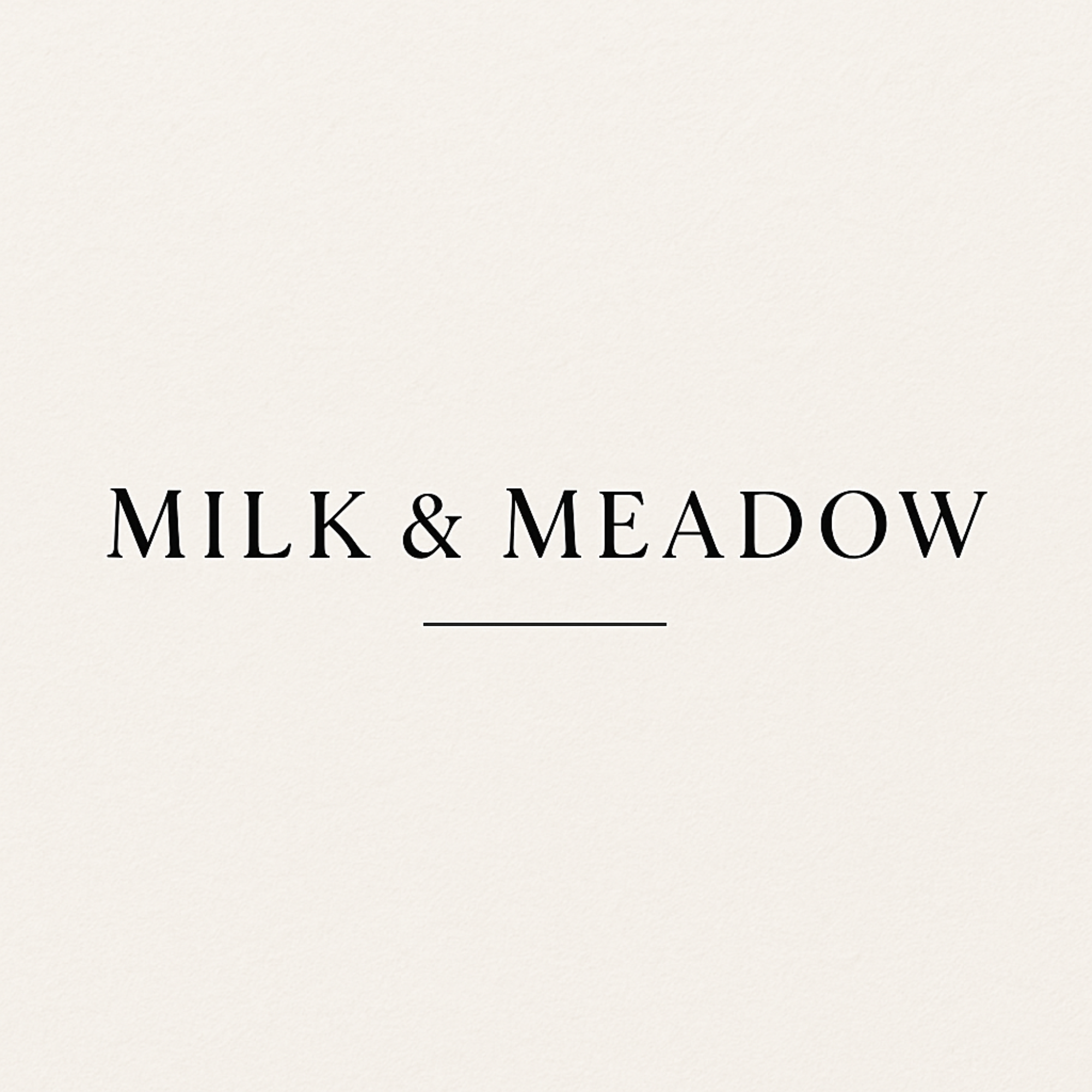 Brand name 'Milk & Meadow' on a light gray background